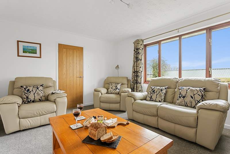 The comfy sitting-room has a Smart TV, the perfect place to relax after a busy day.