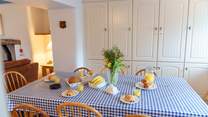 The dining-area is off the second sitting-room, the perfect place to chat about the day ahead.
