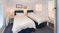 Bedroom 3 has three foot single beds, perfect for either children or adults.
