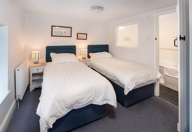 Bedroom 3 has three foot single beds, perfect for either children or adults.