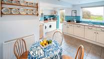 The light and bright kitchen leads out to the spacious back garden.