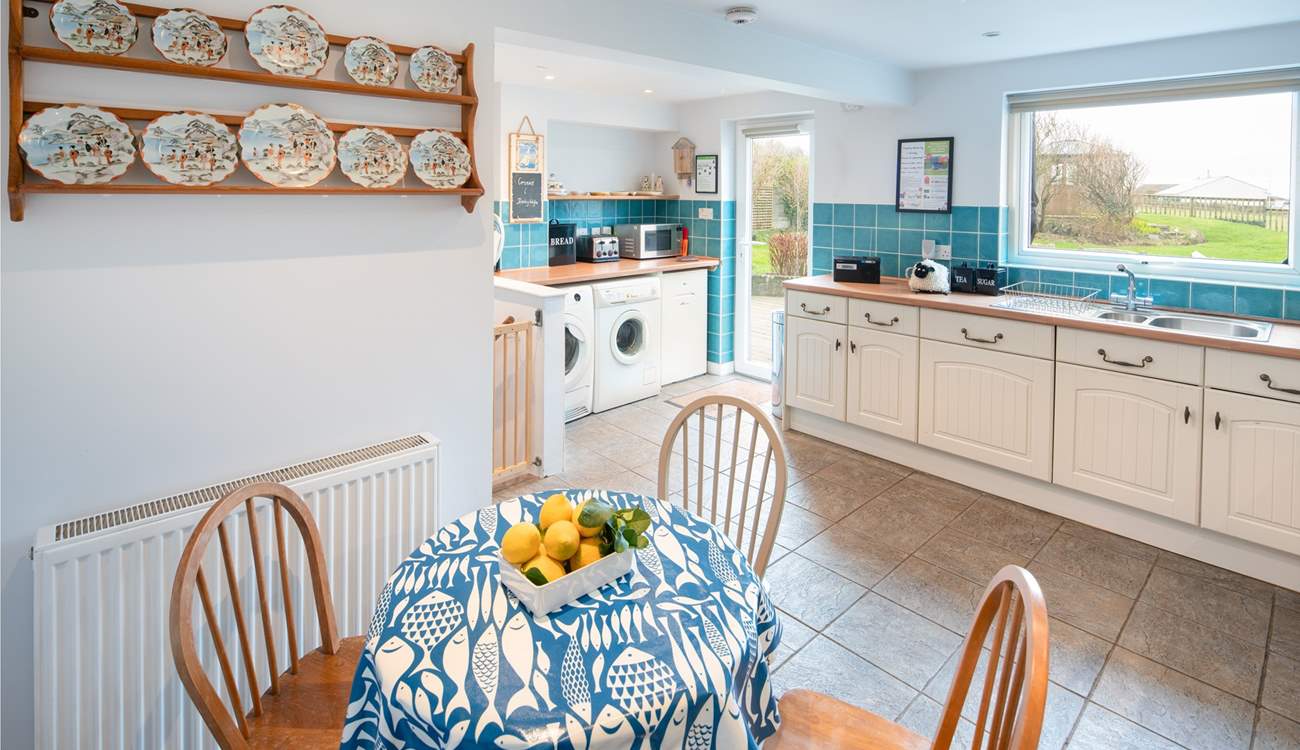 The light and bright kitchen leads out to the spacious back garden.