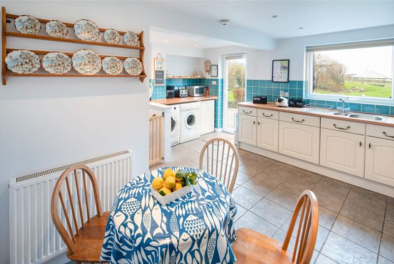 The light and bright kitchen leads out to the spacious back garden.