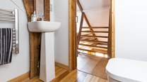 Just one of the interesting areas in this beautifully crafted property - the gorgeous en suite at the top of a wooden staircase.