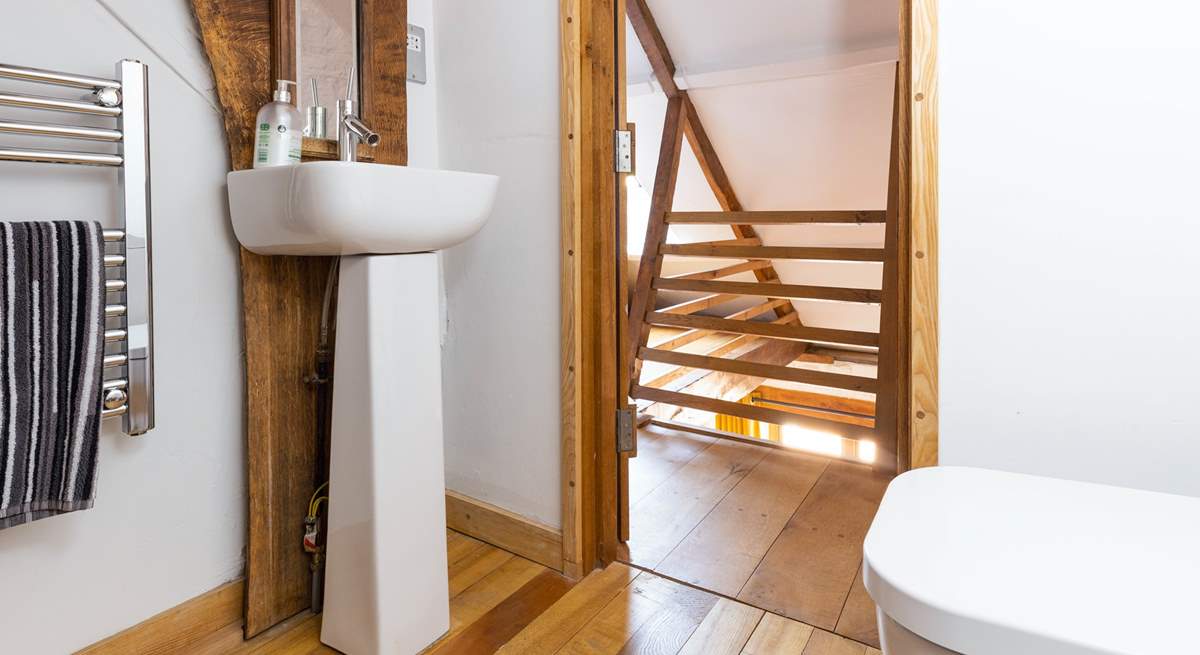 Just one of the interesting areas in this beautifully crafted property - the gorgeous en suite at the top of a wooden staircase.