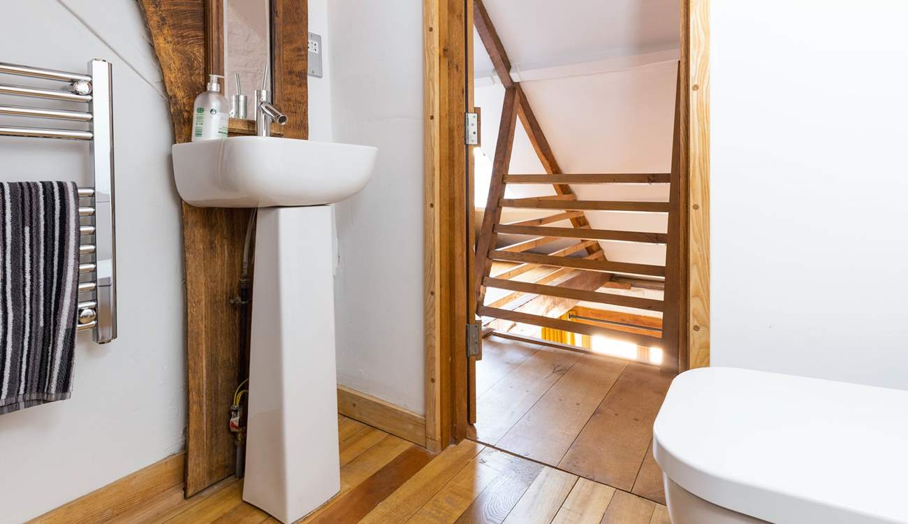 Just one of the interesting areas in this beautifully crafted property - the gorgeous en suite at the top of a wooden staircase.