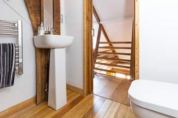 Just one of the interesting areas in this beautifully crafted property - the gorgeous en suite at the top of a wooden staircase.