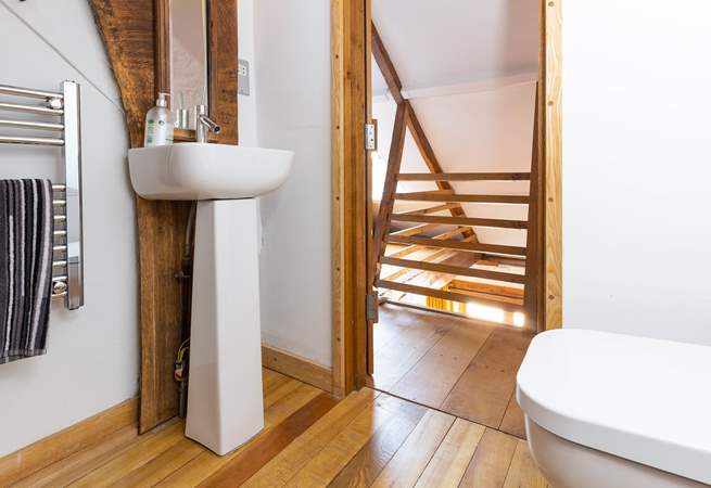 Just one of the interesting areas in this beautifully crafted property - the gorgeous en suite at the top of a wooden staircase.