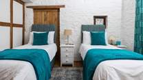 The second bedroom can be configured as a king-size double or as twins, for your convenience.
