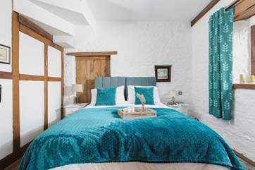 Feel cocooned in comfort, as you snuggle down in this cosy bedroom, which contains 'zip and link' beds that can make a double or twin bedroom.