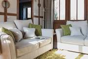 Cosy up on the comfy sofas and relax in the warm glow of the wood-burner.