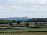 ... which boasts wonderful views of Somerset, complete with distant views of Glastonbury Tor. The perfect place for a cream tea, maybe?