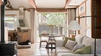 A crafted blend of rustic and contemporary styling greets you in the living space and continues throughout. The log burner creates such a cosy place to be during the colder months...