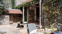Enjoy a little al fresco summer dining, in your completely self-contained courtyard area.