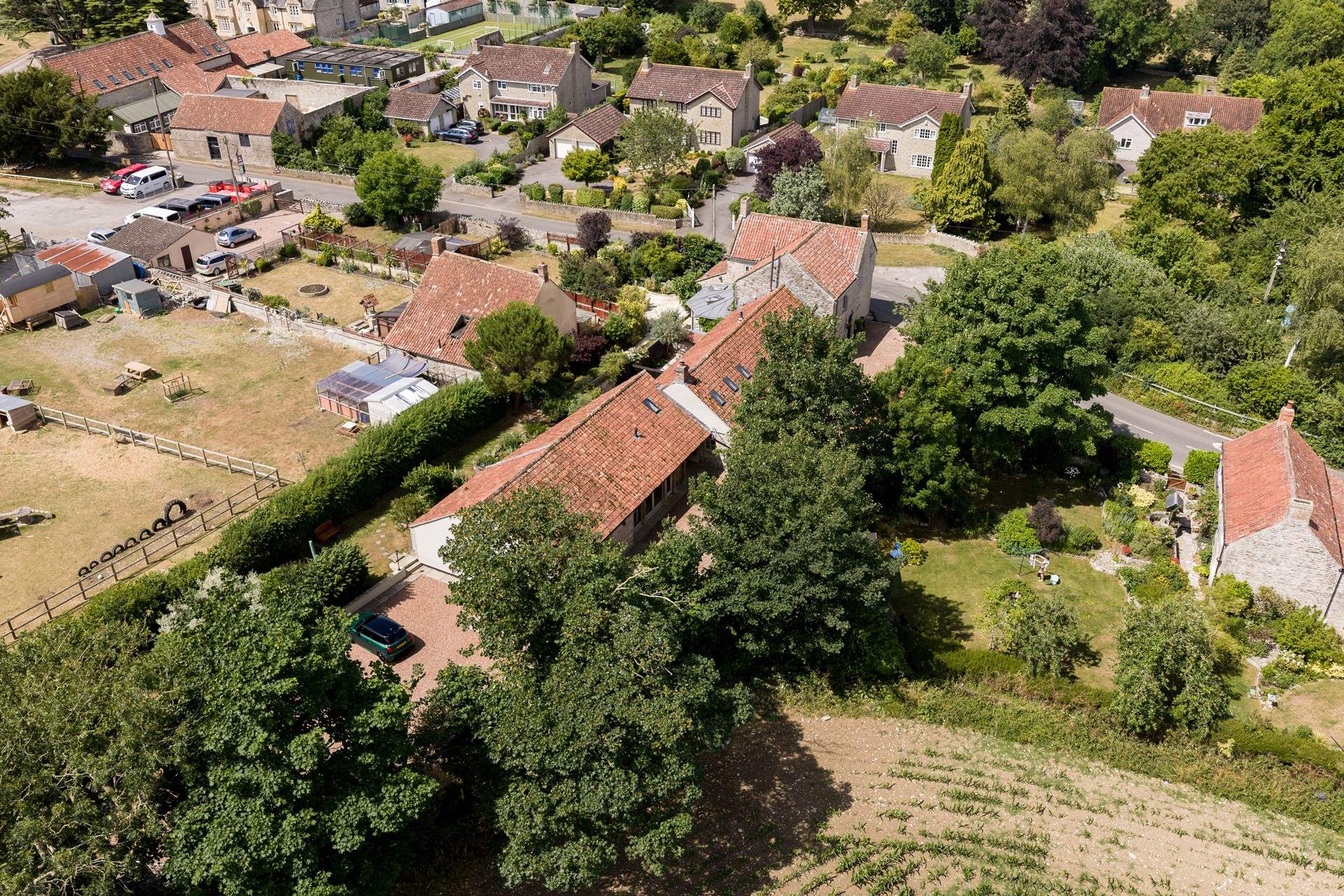 A sense of scale of the main house, The Minstrels and The Smithy