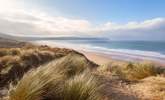 The vast sandy beach at Woolacombe, perfect for surfers and sandcastle creators. - Thumbnail Image