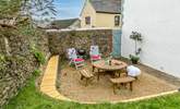 The sheltered outside garden area is perfect for a spot of al fresco dining. - Thumbnail Image