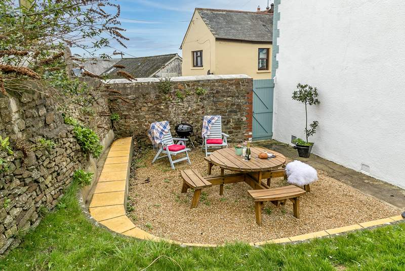 The sheltered outside garden area is perfect for a spot of al fresco dining.