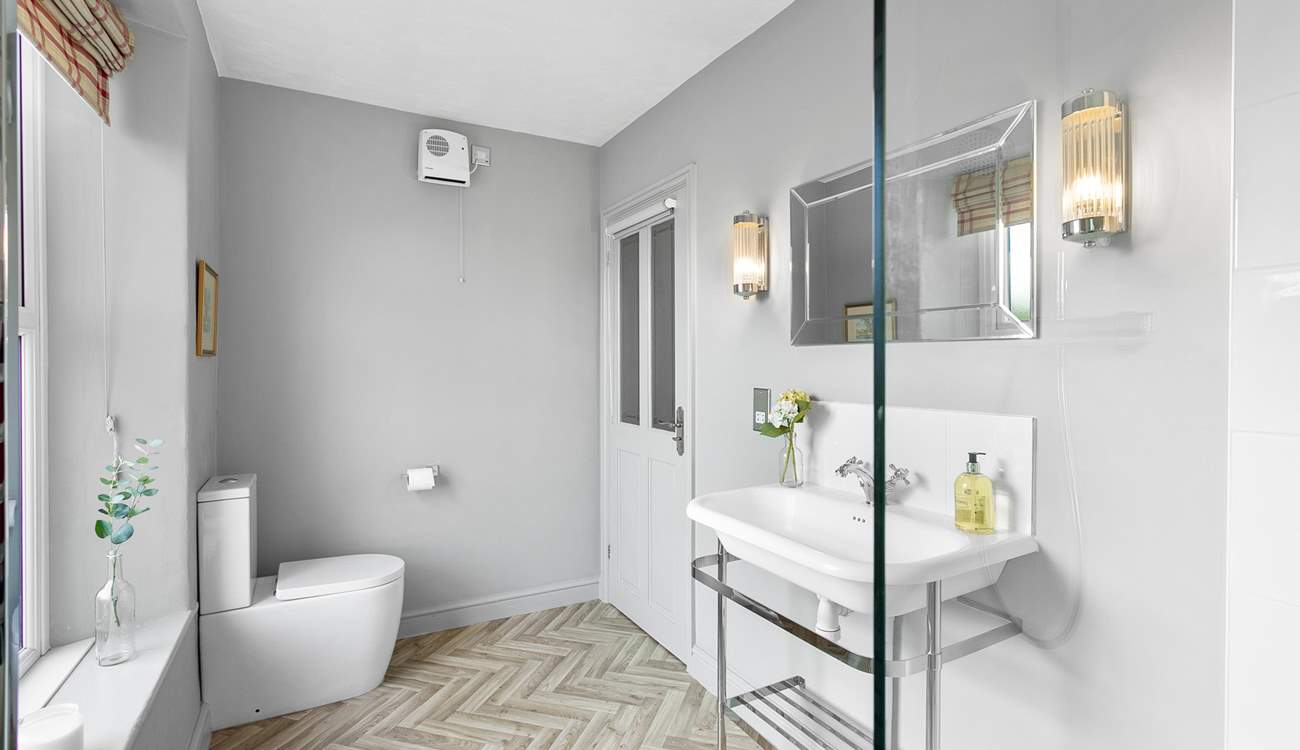 The family shower-room is light and bright.