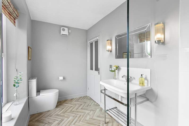 The family shower-room is light and bright.