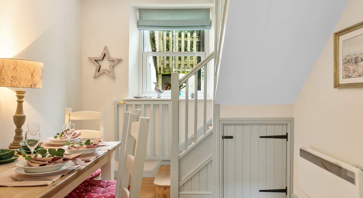 The dining-area adjoins the kitchen.