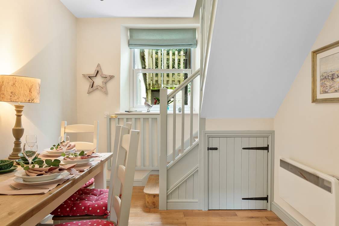 The dining-area adjoins the kitchen.