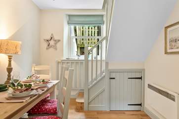 The dining-area adjoins the kitchen.