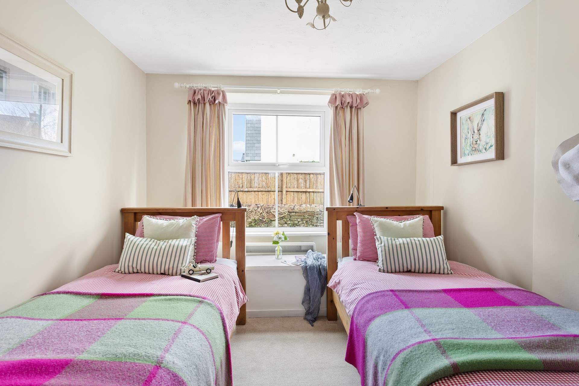 The pretty twin bedroom has three-foot beds, ideal for either children or adults.