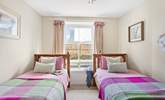 The pretty twin bedroom has three-foot beds, ideal for either children or adults. - Thumbnail Image