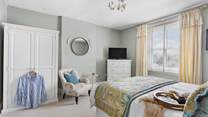 With views out across the village this is such a charming bedroom.