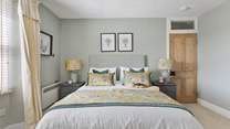 The double bedroom with king-size bed and luxury linens is exquisite. 