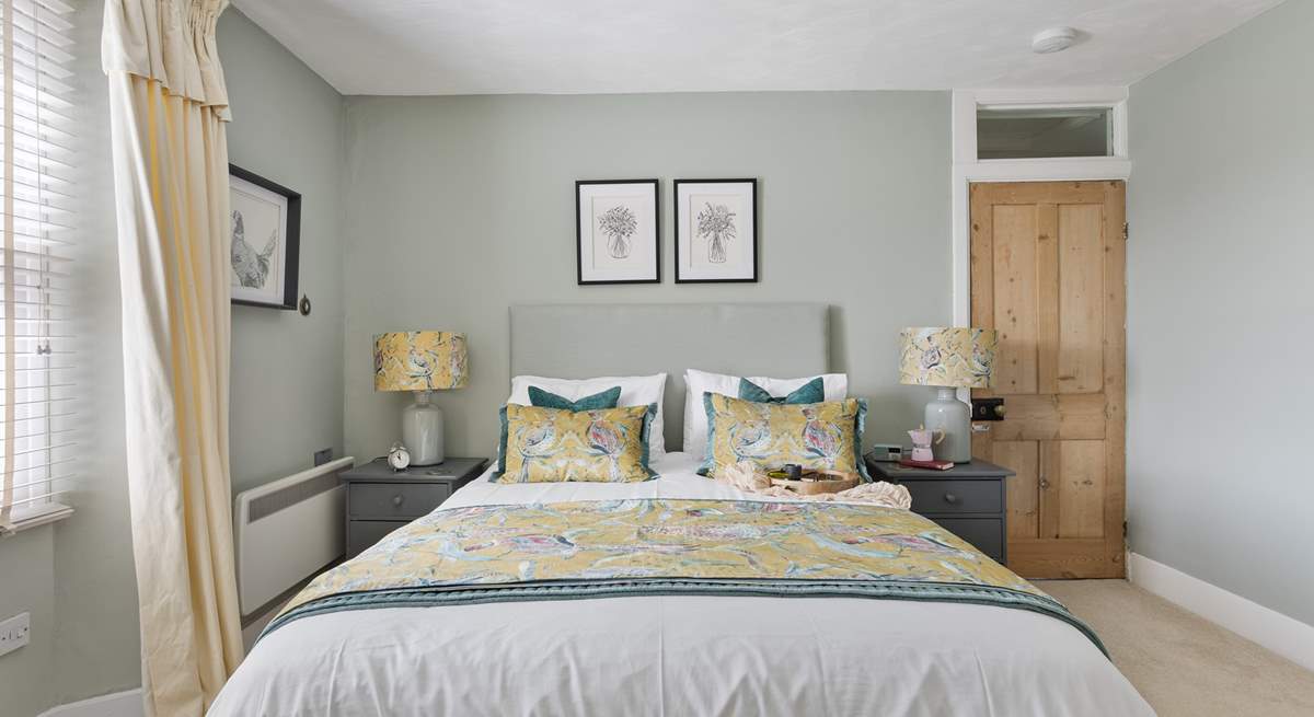 The double bedroom with king-size bed and luxury linens is exquisite. 