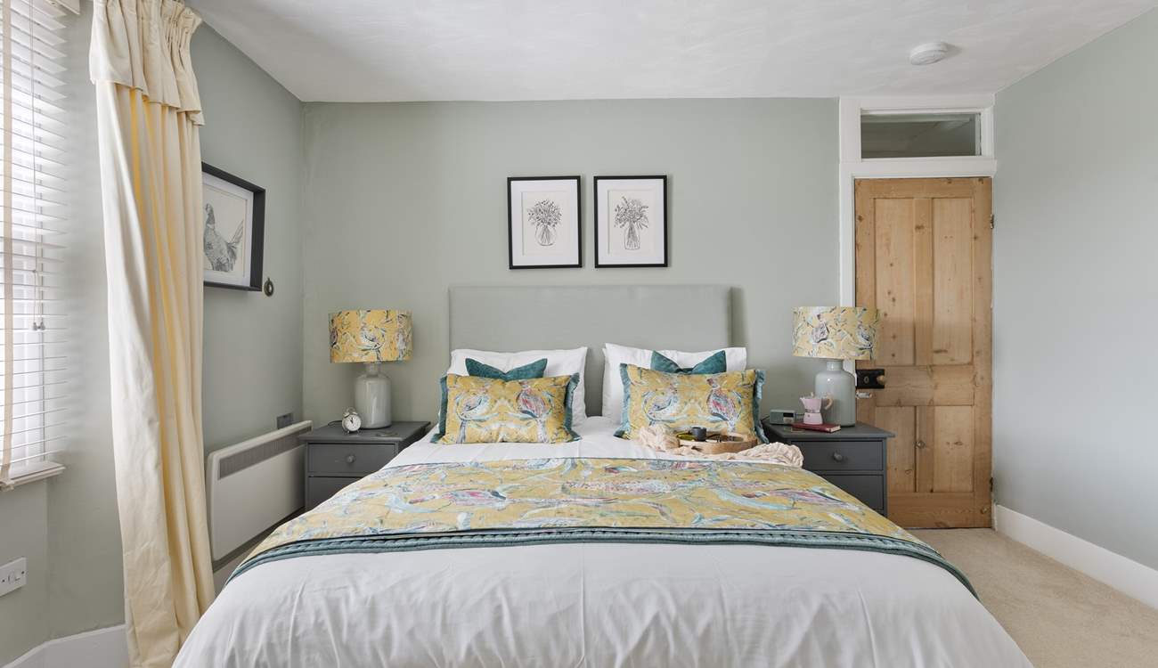 The double bedroom with king-size bed and luxury linens is exquisite. 