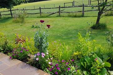 A delightful garden with views over the surrounding countryside.