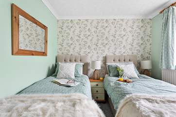 Gorgeous linens in bedroom 2.