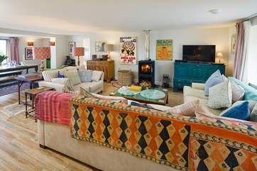 The super cosy sitting-room is gorgeous and wonderfully furnished in Boho style.
