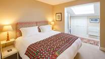 The gorgeous bedroom has a super-king bed has an adjoining twin bedroom.