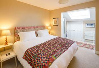 The gorgeous bedroom has a super-king bed has an adjoining twin bedroom.