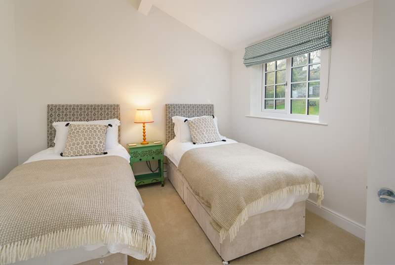 Bedroom 1 has twin beds, ideal for either children or adults.