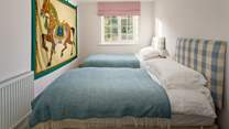 Another lovely twin bedroom.