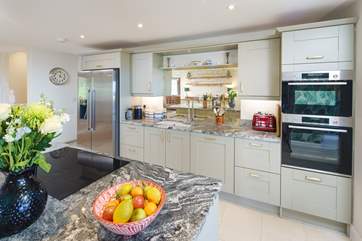 Create a culinary masterpiece in the stylish kitchen.