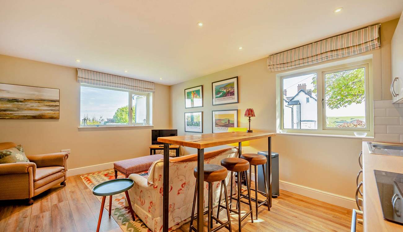 The second open plan living-area on the ground floor has a TV and lovely views...