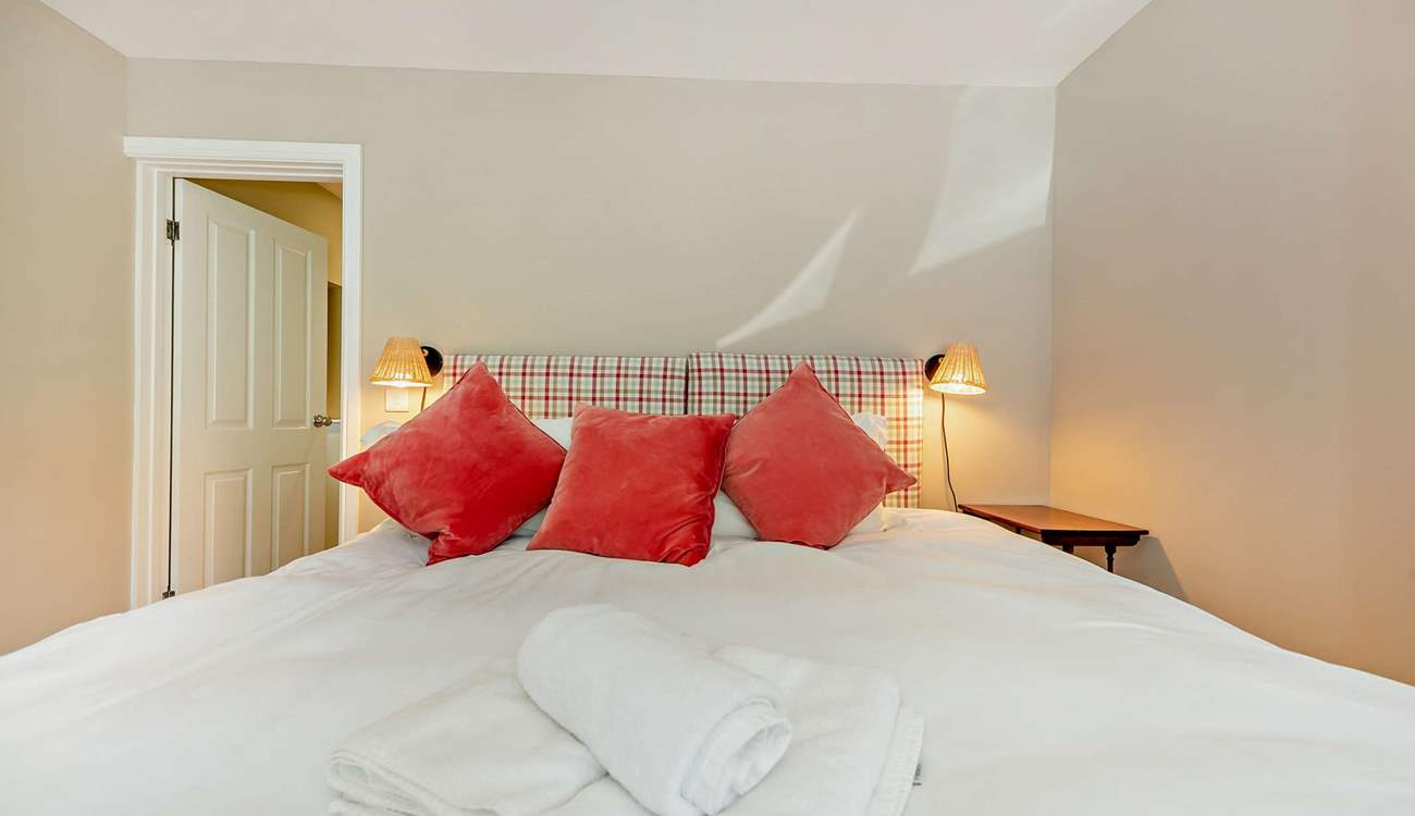 Bedroom 1 on the ground floor has a super-king bed and the bathroom is just next door, with bath and separate shower. 