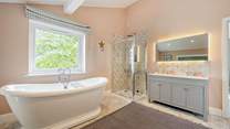 This beautiful bathroom is shared with bedrooms 6 and 7.