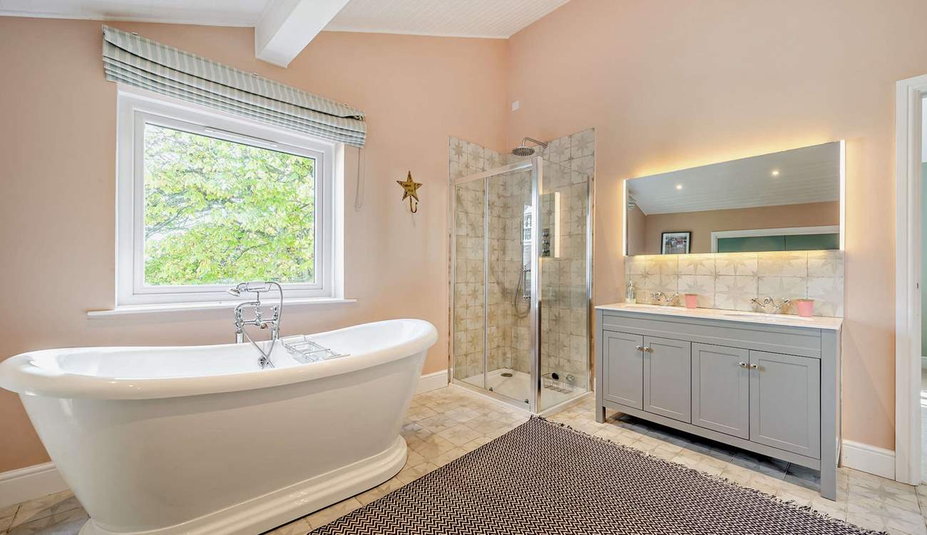 This beautiful bathroom is shared with bedrooms 6 and 7.