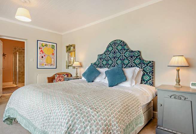 The stylish main en suite bedroom with far reaching sea views. Take breakfast on your private balcony. Bliss. 