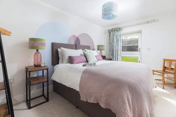 Bedroom 1 is beautifully furnished in soft pastel shades and can be made up as either a king-size bed or twins.