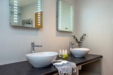 There are twin sinks in the en suite bathroom