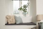 Take a pew at the window to look out across the garden.