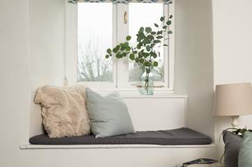 Take a pew at the window to look out across the garden